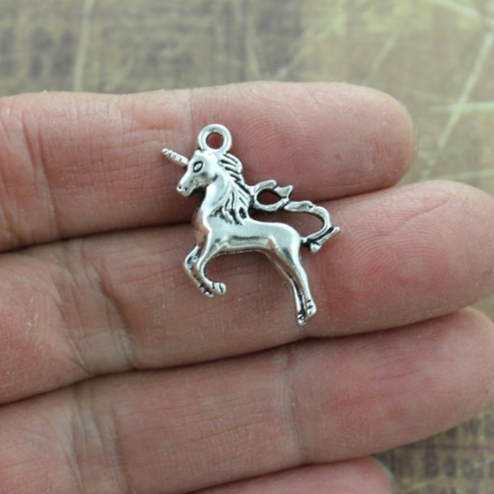 3/$30 Unicorn charm!